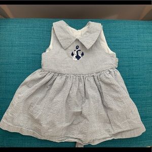 Adorable baby seersucker dress.